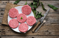 HAMBURGUESA ARTESANAL DE CERDO/RES x 4 UND (125 gr/und)